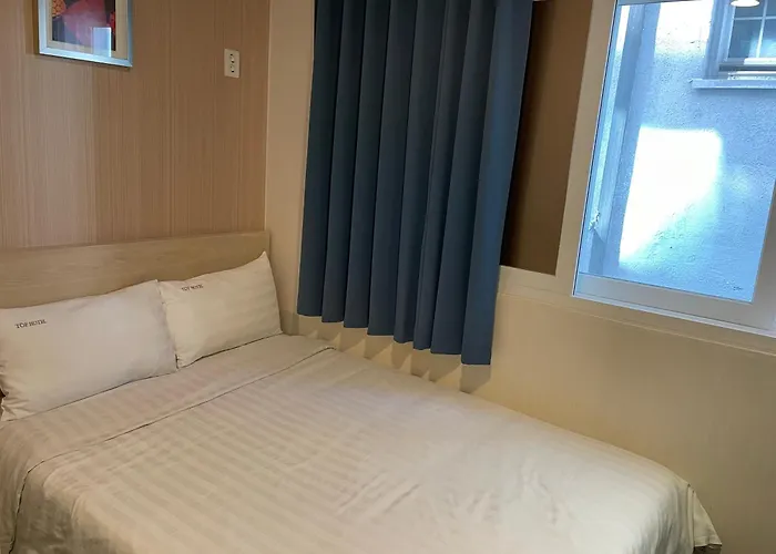 & Aparthotel