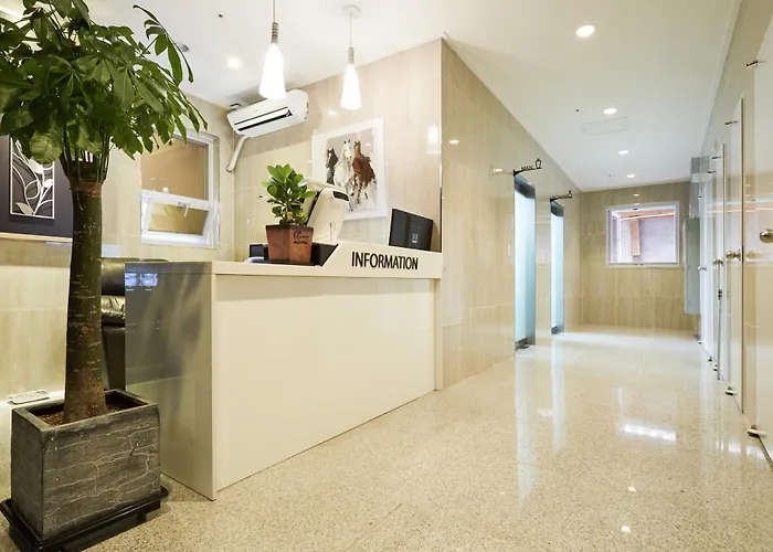 & Aparthotel